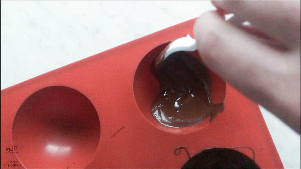 put chocolate in mold